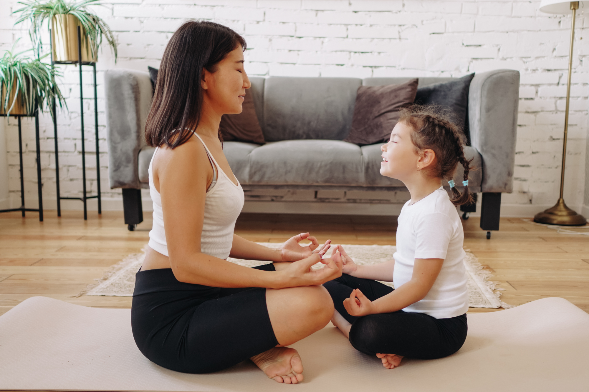 child and adult practising mindfulness