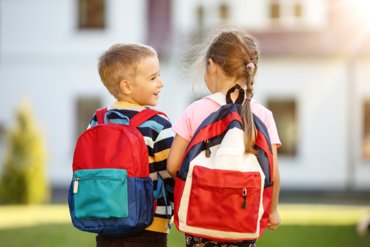 Children walking into school on the first day of term